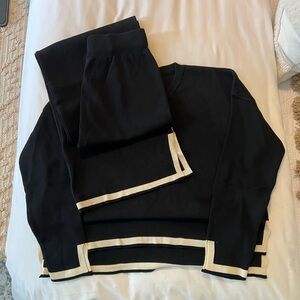 Two piece set knit material. Size medium. Never worn